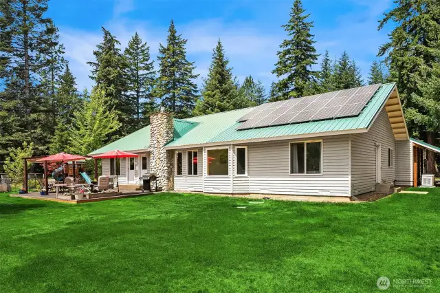 Check out the SOLAR PANELS! Low, low power bills. Also included with sale is a Generac generator, automatically comes on when the power goes out!