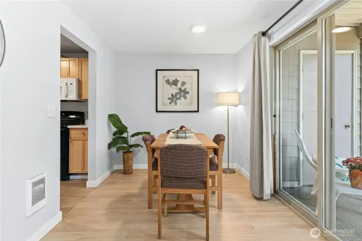 Dining with plentiful natural light from glass slider