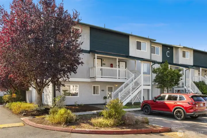 The front garden bed is yours to play with! Parking spot 74 is right out front. There is also ample guest parking in the community