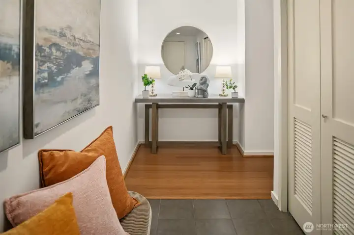 A generous entry way into this 918 SF condo! (photo from previous staging)
