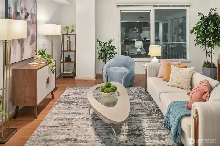 The open concept living area. (photo from previous staging)