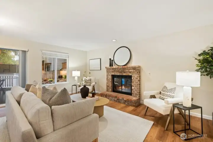 Cozy wood-burning fireplace in family room