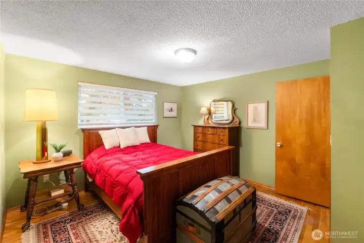 One of three spacious bedrooms