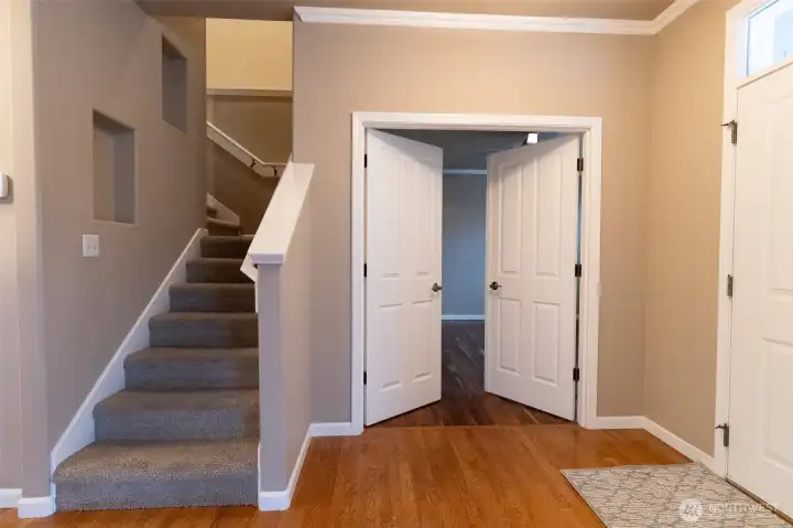 Stairs and primary double doors