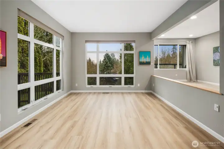 Light-filled  lowered living room space perfect for your designer furniture.Towering window scapes, and seamless flow ideal for entertaining guests and hosting seasonal celebrations.