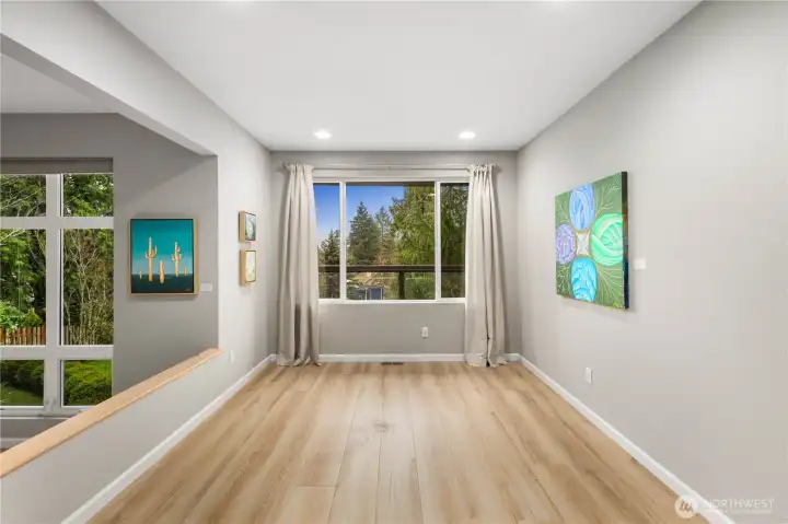 Formal dining space makes for formidable dinner parties., recessed lighting, art display walls, and large window framing frames serene easterly mountain/territorial views.