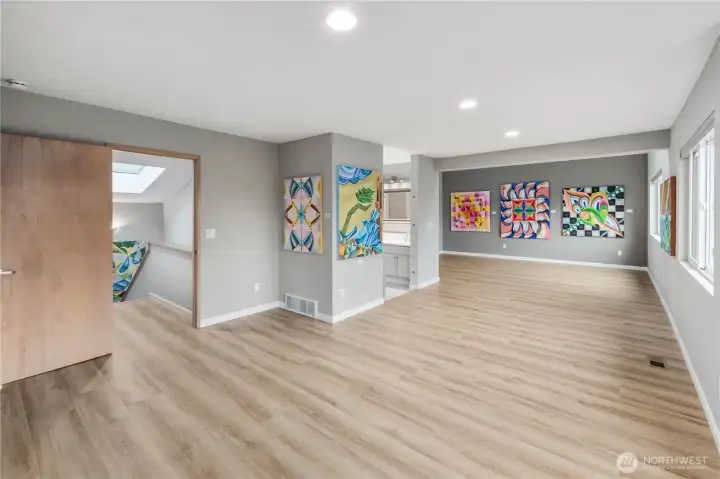 This full floor primary suite offers privacy, views of the Cascades and a large walk in closet with security safe and loads of privacy