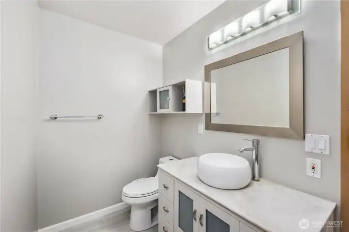 Main floor power room for guests