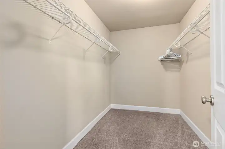 The walk-in closet of the second bedroom is approximately 10’x7’, so a huge space to accommodate your dream closet layout with room for a sitting space, dresser or deluxe sized wardrobe!