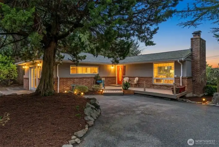 Lake Forest Park 5-bedroom home with wide driveway and updated exterior, ideally located near I-5, I-405, Hwy 522 and light rail access.