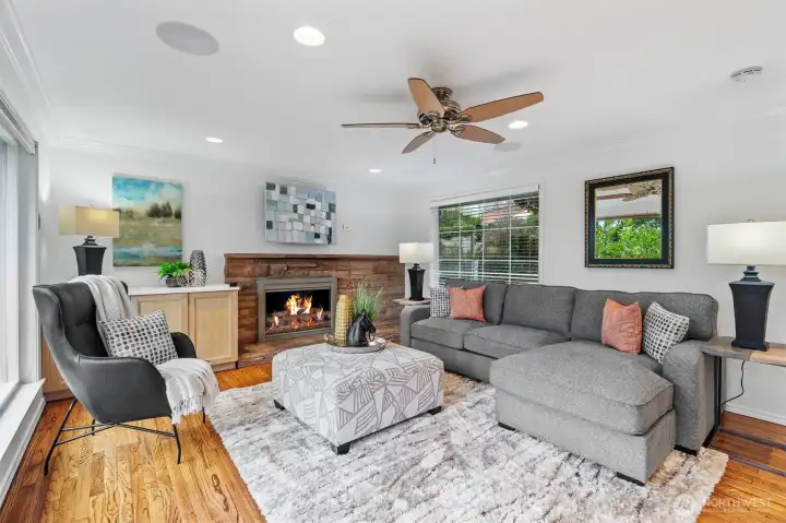 Hardwired Wi-Fi access points, ethernet wiring, in-ceiling speakers, security cameras, doorbell camera, and pull-down TV mount with HDMI and speaker wiring.