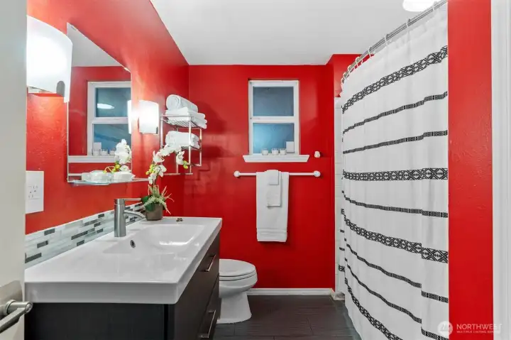 Full lower-level bathroom supporting independent living space in this versatile Lake Forest Park home.