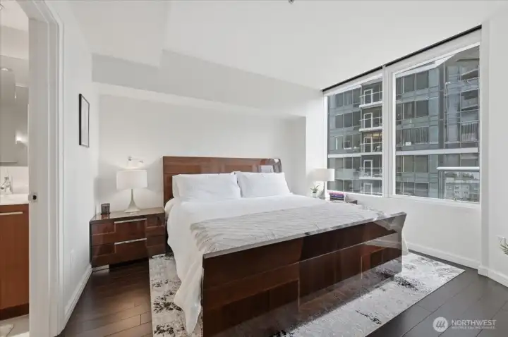 Primary bedroom with automated blinds