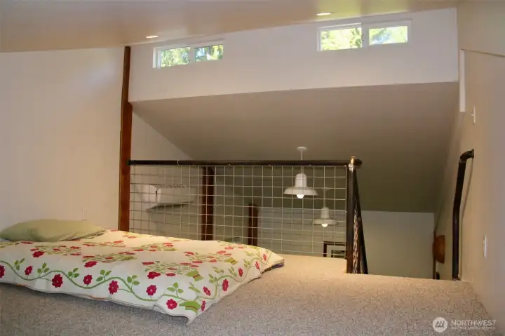 Loft with natural light finishes off this space.