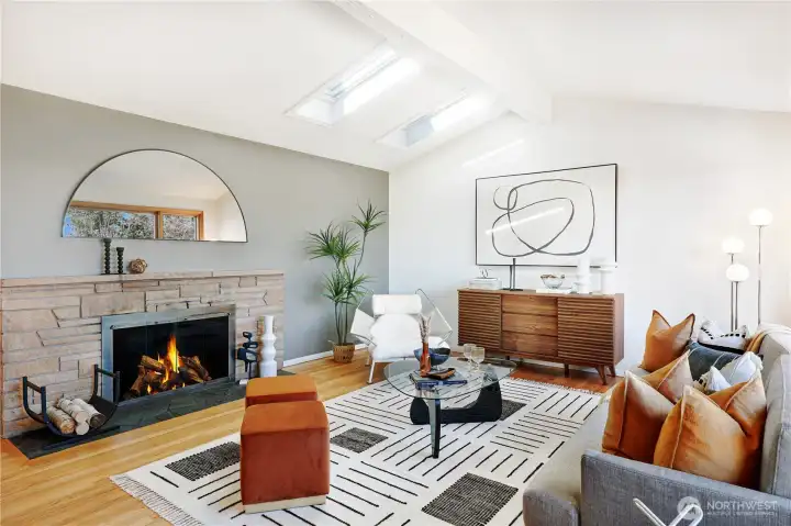 Cozy up next to the fireplace with your book under the skylights