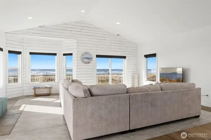 Vaulted ceilings, recessed lighting, sliding door to let the ocean breeze in and those views! You have to see this one.