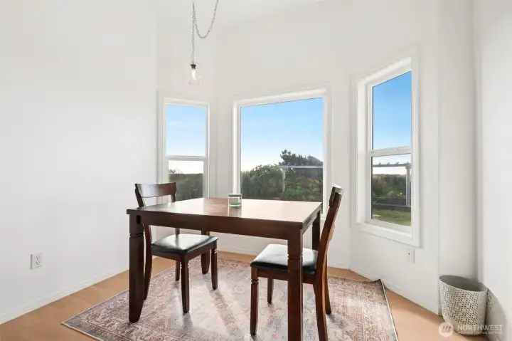 Entry level kitchenette with dining space.