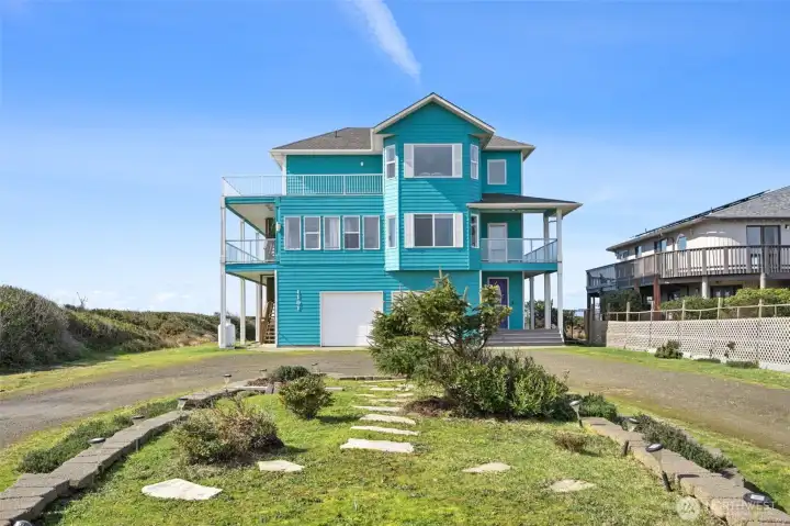 A statement home with thoughtful spaces and ocean views. Come and see this one!