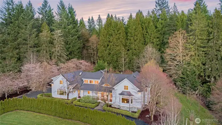 Welcome to this Aspenwood Estate...a private retreat tucked away at the end of a cul-de-sac, where tranquility,  space, and timeless design come together.