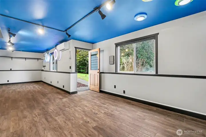 NEW lower level game room with yard access.