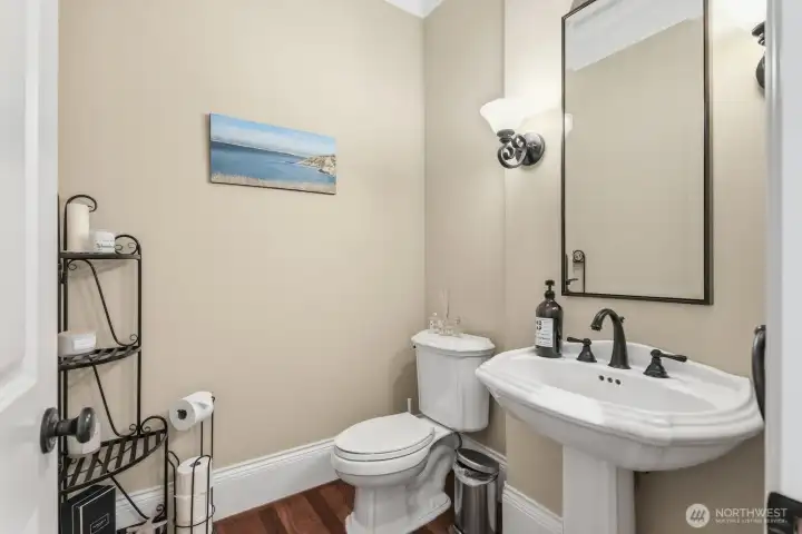 Guest powder bath off the formal and informal areas.