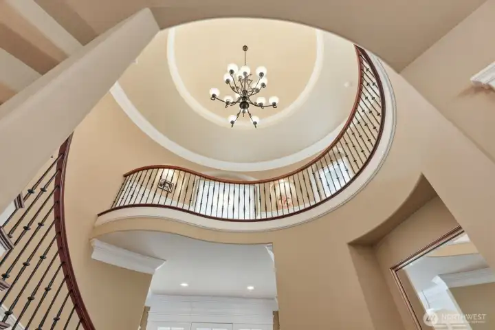 Opulent stairway in the foyer.