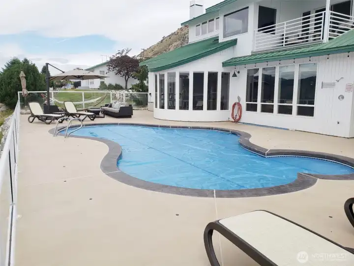 Large in-ground pool and deck