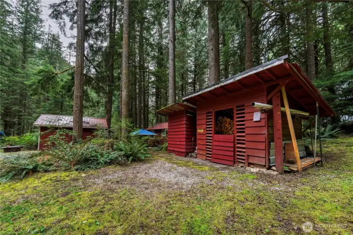 Woodshed providing dry, organized firewood storage.
