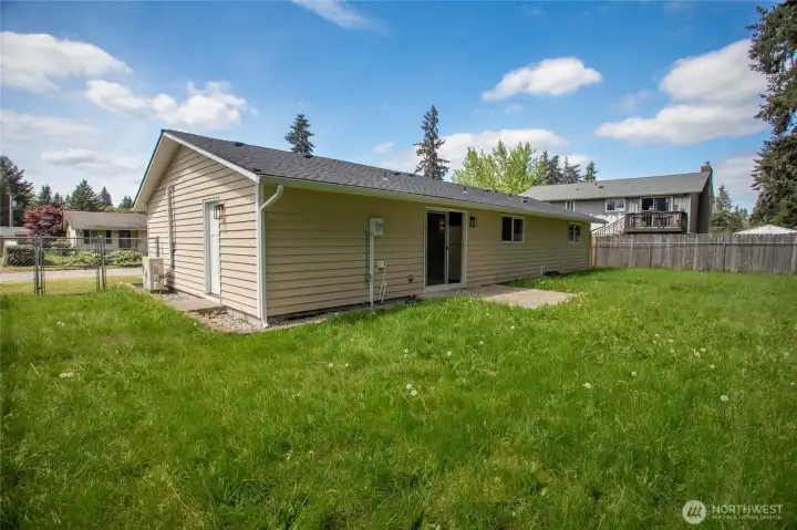Enjoy a spacious and fully-fenced backyard and then retreat inside to the A/C!