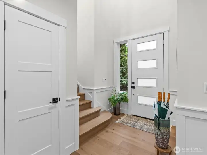 Entry foyer with deep guest coat closet.
