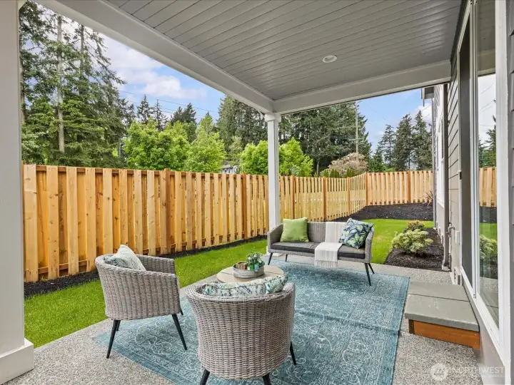 Covered back patio measuring 10' by 12' with gas stub out for a BBQ.