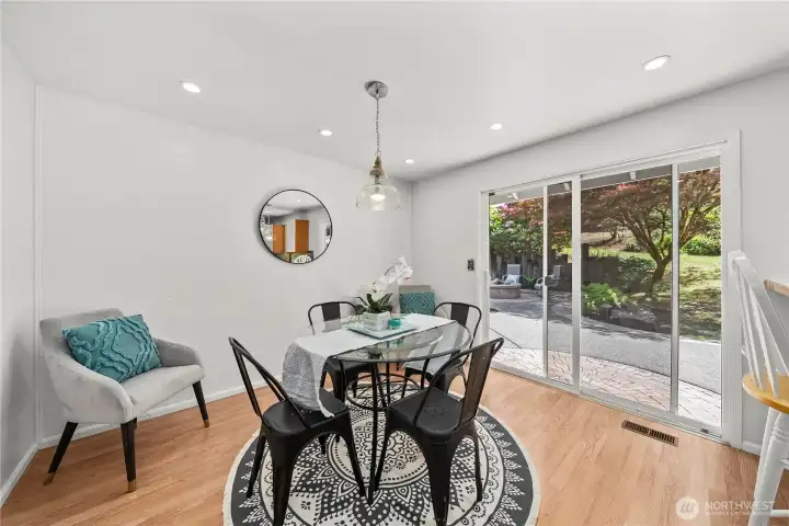 Kitchen nook with shiplap, updated fixtures and direct access to Patio.  Great entertainment options