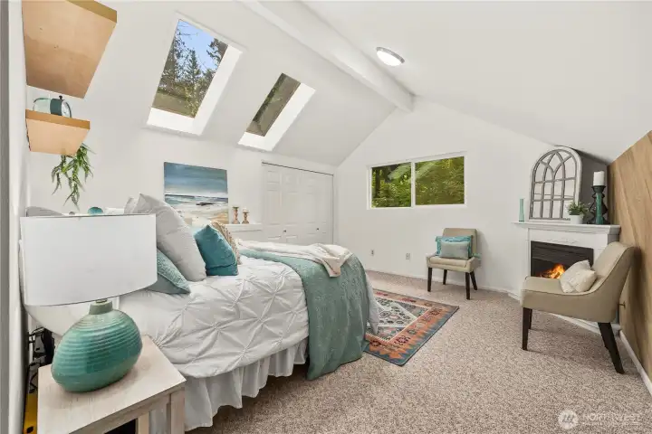 Primary bedroom with private ensuite and ample light