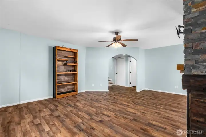 Hidden door in downstairs wall. Located behind bookshelf.