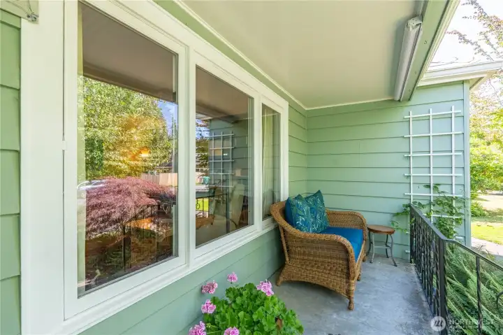 Covered front porch. Notice the pull down sun shades! Covered front porch. Notice the pull down sun shades!