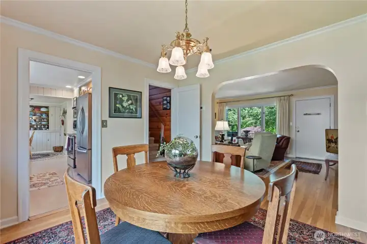 Notice arched entry. Kitchen at left. Chandelier will be replaced as seller wishes to retain sentimental fixture. Notice arched entry. Kitchen at left. Chandelier will be replaced as seller wishes to retain sentimental fixture.