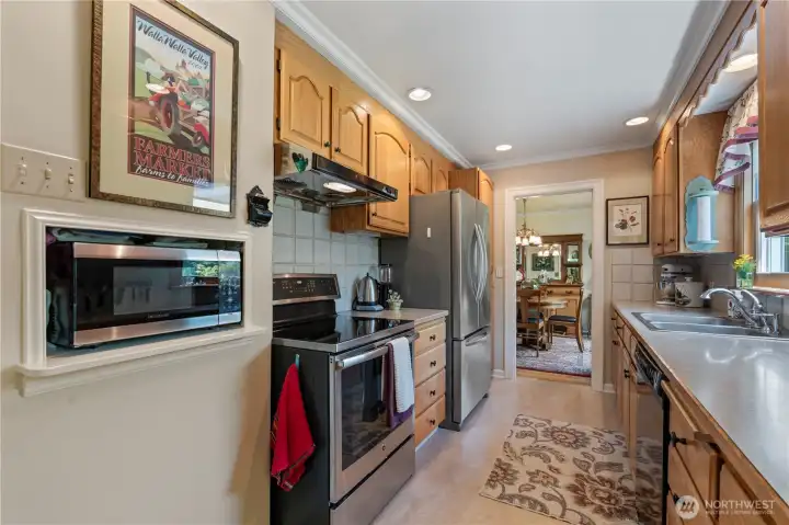 All appliances remain with home, including recent range/convection oven (plumbed also for gas). All appliances remain with home, including recent range/convection oven (plumbed also for gas).