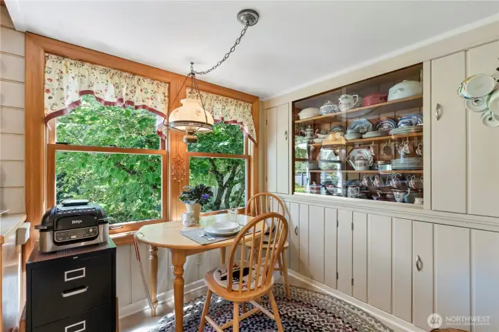 Another viewpoint at end of kitchen. Notice built-ins. Just behind the photographer is short hallway to half-bath, garage, and basement stairs Another viewpoint at end of kitchen. Notice built-ins. Just behind the photographer is short hallway to half-bath, garage, and basement stairs