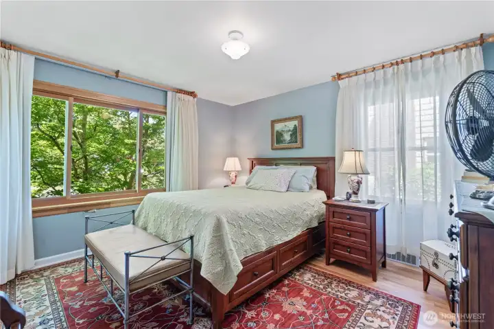 And the primary bedroom, of course. Lots of natural light! And the primary bedroom, of course. Lots of natural light!