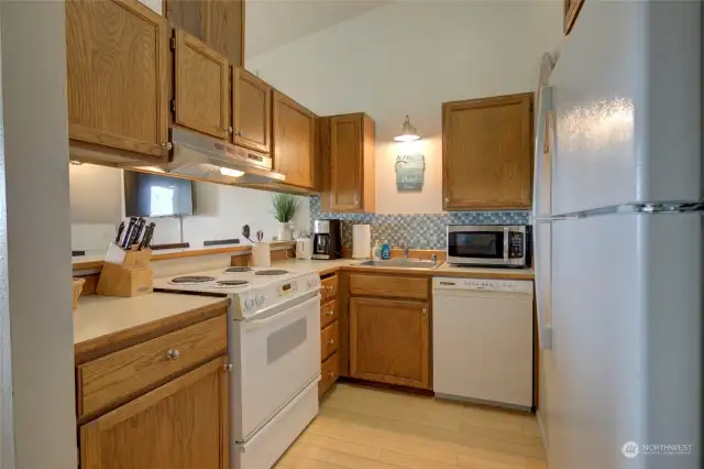 Recently updated appliances make the kitchen feel fresh and new.