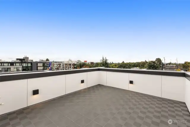 Take in stunning views from this spacious rooftop deck. Ideal for outdoor entertaining or simply relaxing under the sky.