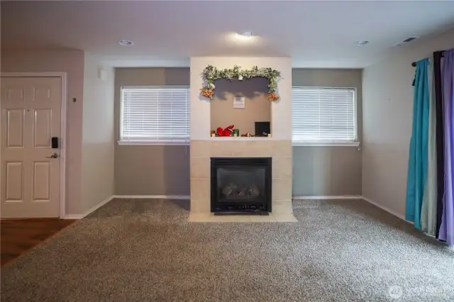 The living room has a nice fireplace for ambiance and will keep you warm on those chilly nights.