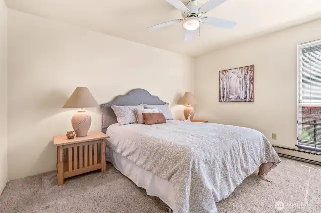 Bedroom with ceiling fan.
