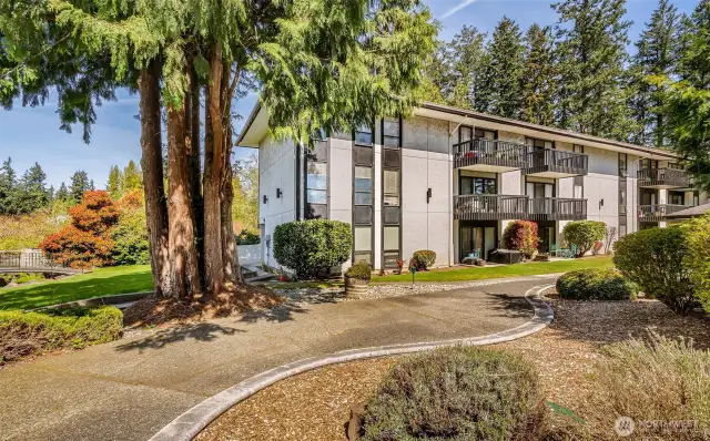 View of unit from parking area.  Your space is #19 and very easy to walk without stairs via the side doors.
