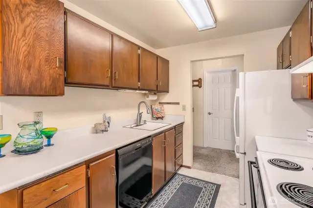 Kitchen with plenty of counter space, newer refrigerator.
