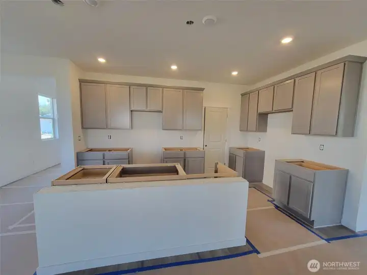 steel gray cabinets, actual home under construction.