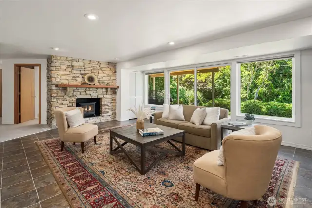 Spacious lower level family room with fireplace
