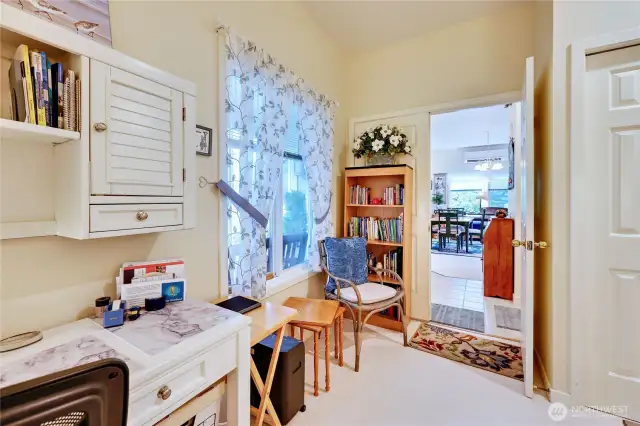 View to entry and dining area from second bedroom