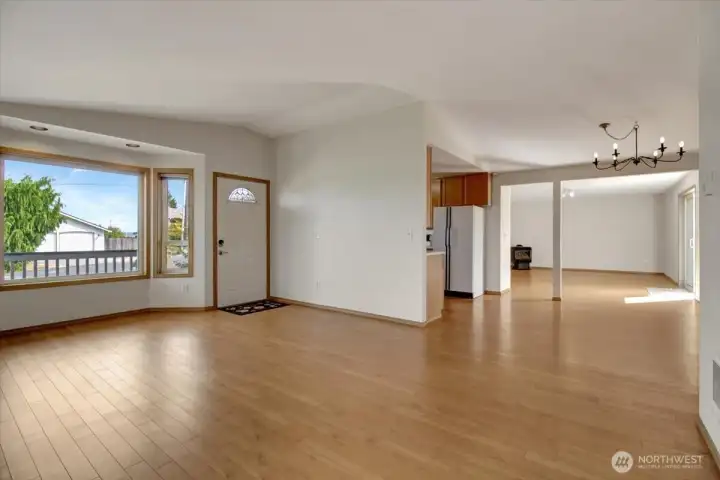 View from the living room into the dining area and the family room.