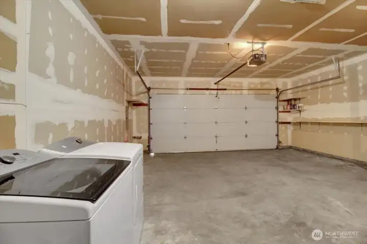 Laundry in the spacious 2 car garage.